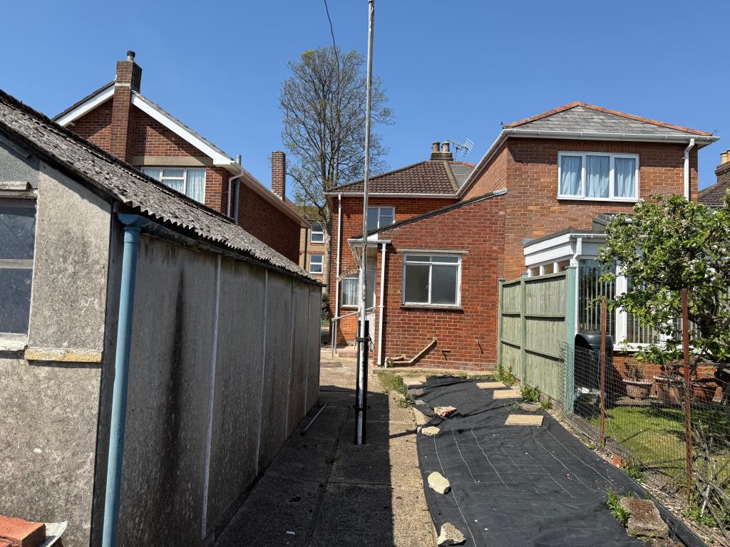 Lot: 134 - HOUSE FOR IMPROVEMENT - Rear view of the house taken from back garden